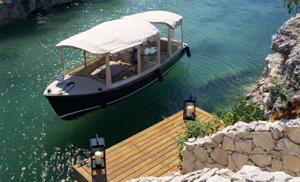 Rosewood Mayakoba Boat on Lagoon