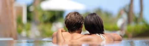 Couple in Infinity Pool on Holiday